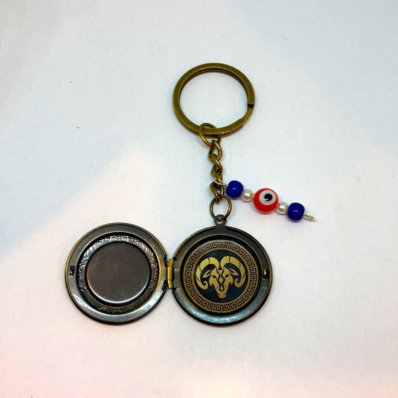 Zodiac Aries Locket Keychain: Embracing Courage with Greek Key & Evil Eye Charm - Picture 2 of 3